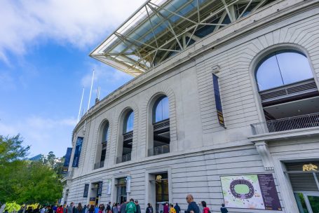 A group of people standing outside of a building.