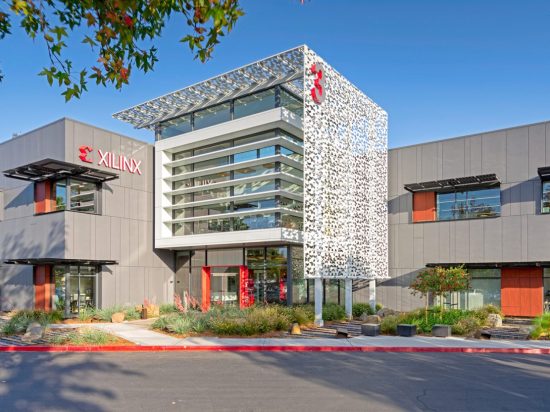 A building with a red sign on the front of it.