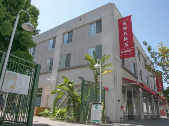 A building with a red sign on the front of it